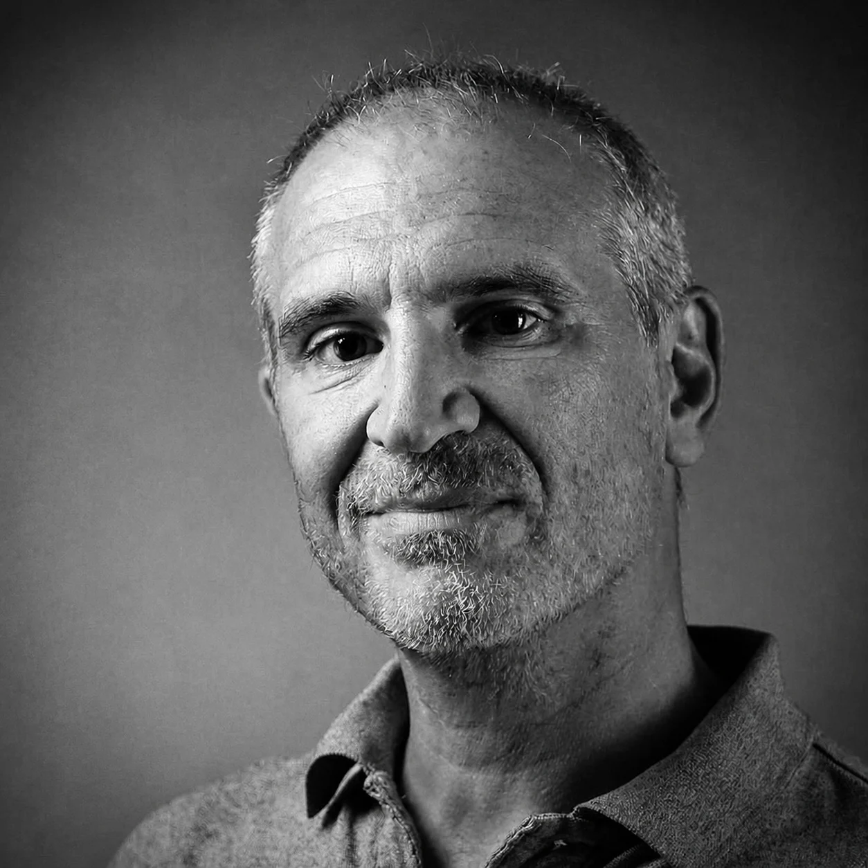 Black-and-white portrait of Olivier Ottavi, French photographer in London